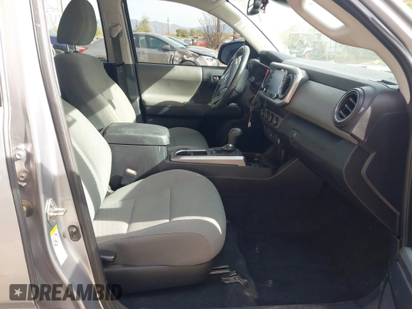 2020 Toyota Tacoma SR5 with VIN 3TMCZ5AN1LM324828, listed as a IAAI auction lot 40977362 with 33,906 mi miles and . Bid and sale history available at DreamBid. Image 5.