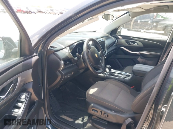 2018 Chevrolet Traverse LT Cloth z VIN 1GNERGKW0JJ242781, wystawiony jako IAAI lot #42458318 z przebiegiem 16 177 mil mil oraz . Historia ofert i sprzedaży dostępna na DreamBid. Obrazek 5.