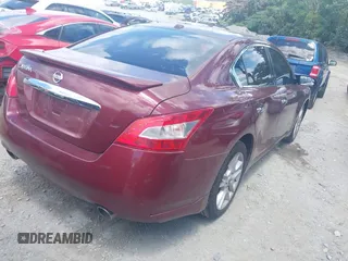 2011 Nissan Maxima S with VIN 1N4AA5AP8BC851559, listed as a IAAI auction lot 42534444 with 222,289 mi miles and . Bid and sale history available at DreamBid. Image 4.