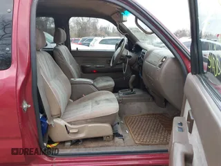 1999 Toyota Tacoma PreRunner z VIN 4TASM92N0XZ443454, wystawiony jako IAAI lot #41907523 z przebiegiem 237 864 mil mil oraz . Historia ofert i sprzedaży dostępna na DreamBid. Obrazek 5.