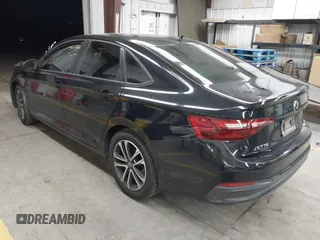 2022 Volkswagen Jetta Sport with VIN 3VWBM7BU9NM006080, listed as a IAAI auction lot 42433645 with Not provided miles and . Bid and sale history available at DreamBid. Image 3.