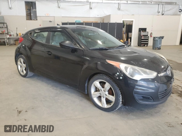 2012 Hyundai Veloster w/Black Int z VIN KMHTC6AD6CU043856, wystawiony jako Copart lot #53052335 z przebiegiem 170 035 mil mil oraz Czysty tytuł • Clean title. Historia ofert i sprzedaży dostępna na DreamBid. Obrazek 4.