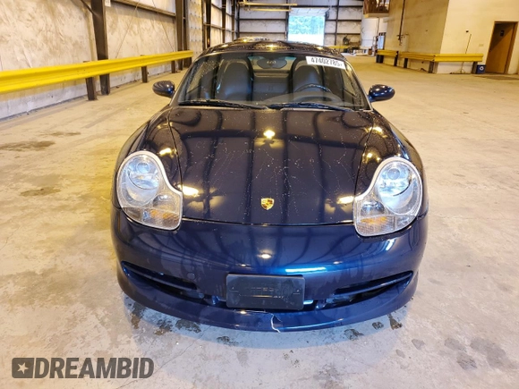 1999 Porsche Boxster z VIN WP0CA2983XU630435, wystawiony jako Copart lot #47402785 z przebiegiem 62 180 mil mil oraz Szkoda całkowita • Salvage title. Historia ofert i sprzedaży dostępna na DreamBid. Obrazek 5.