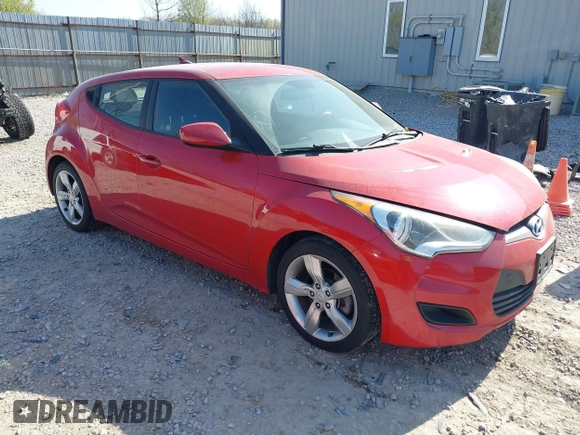 2014 Hyundai Veloster with VIN KMHTC6AD2EU214847, listed as a IAAI auction lot 42067728 with 77,421 mi miles. Bid and sale history available at carsss.com. Image 1.