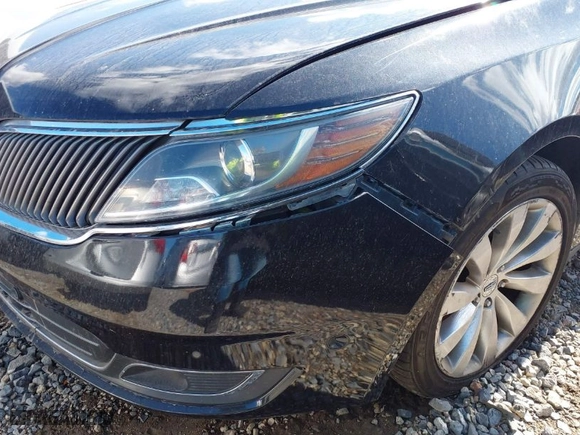 2014 Lincoln MKS with VIN 1LNHL9DK8EG600981, listed as a IAAI auction lot 41359187 with 158589 miles. Bid and sale history available at carsss.com. Image 18.