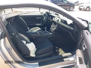 2018 Ford Mustang EcoBoost with VIN 1FA6P8THXJ5128830, listed as a IAAI auction lot 42192673 with 58,817 mi miles and . Bid and sale history available at DreamBid. Image 5.