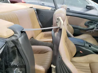 2001 Pontiac Firebird Trans Am z VIN 2G2FV32G812134704, wystawiony jako Copart lot #74893594 z przebiegiem Nie podano mil oraz Nie do naprawy • Non repairable. Historia ofert i sprzedaży dostępna na DreamBid. Obrazek 10.