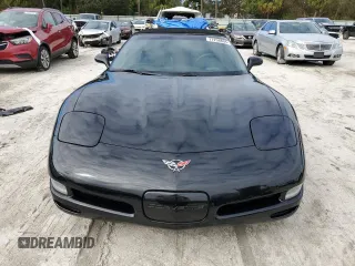 2002 Chevrolet Corvette with VIN 1G1YY32G325123703, listed as a Copart auction lot 77258804 with 26,325 mi miles and Salvage Title. Bid and sale history available at carsss.com. Image 5.