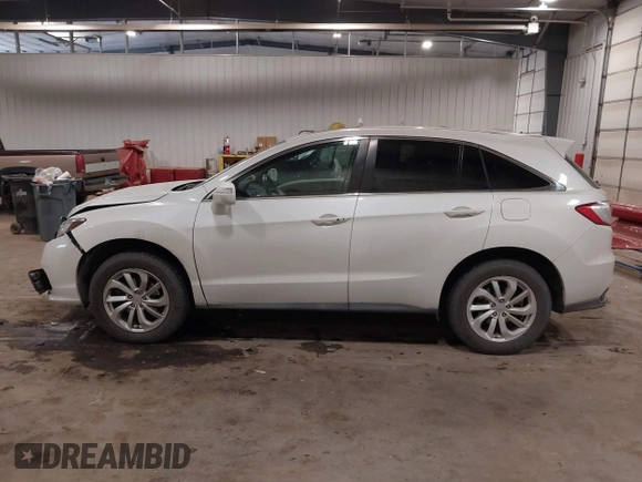 2016 Acura RDX Tech Pkg with VIN 5J8TB4H56GL018592, listed as a IAAI auction lot 41091796 with 101,569 mi miles. Bid and sale history available at carsss.com. Image 14.