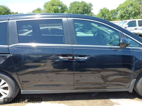 2016 Honda Odyssey EX-L with VIN 5FNRL5H61GB089853, listed as a IAAI auction lot 42019081 with 81,317 mi miles and . Bid and sale history available at DreamBid. Image 14.