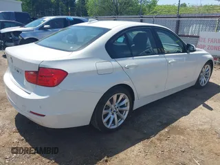 2015 BMW 3 Series 320i xDrive with VIN WBA3C3G50FNT51569, listed as a IAAI auction lot 42054171 with 74,305 mi miles and . Bid and sale history available at DreamBid. Image 4.