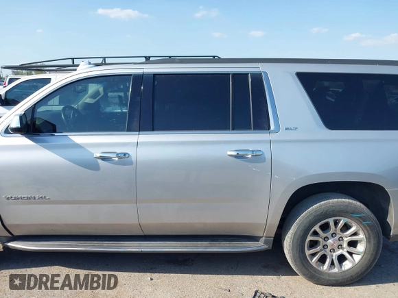 2016 GMC Yukon XL SLT z VIN 1GKS1GKC3GR268945, wystawiony jako IAAI lot #41864816 z przebiegiem 171 815 mil mil oraz . Historia ofert i sprzedaży dostępna na DreamBid. Obrazek 14.