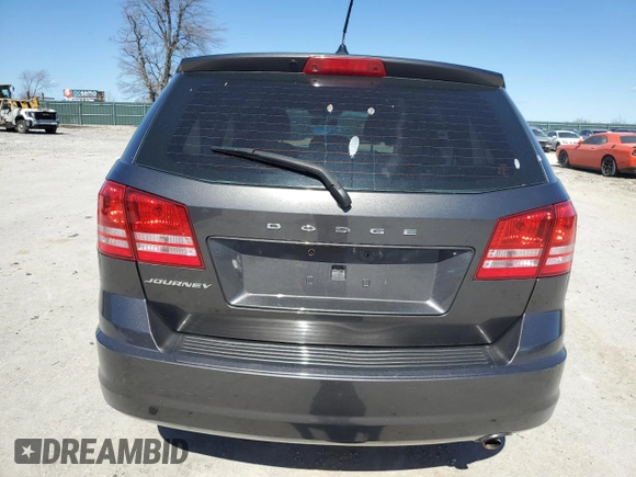 2015 Dodge Journey American Value with VIN 3C4PDCAB2FT538201, listed as a Copart auction lot 47058615 with 135,280 mi miles and Salvage Title. Bid and sale history available at DreamBid. Image 6.