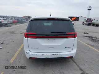 2023 Chrysler Pacifica Hybrid Touring L z VIN 2C4RC1L74PR540870, wystawiony jako IAAI lot #42056528 z przebiegiem 46 940 mil mil oraz . Historia ofert i sprzedaży dostępna na DreamBid. Obrazek 17.