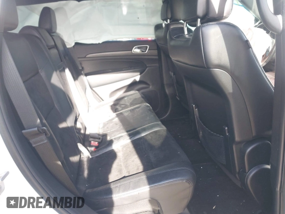2017 Jeep Grand Cherokee Laredo with VIN 1C4RJFAG9HC910422, listed as a IAAI auction lot 41185537 with 84,784 mi miles. Bid and sale history available at carsss.com. Image 8.