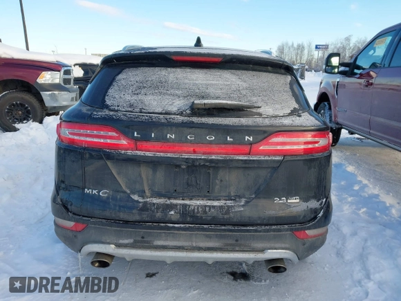 2015 Lincoln MKC with VIN 5LMTJ2AHXFUJ01440, listed as a IAAI auction lot 41526975 with 104,280 mi miles. Bid and sale history available at carsss.com. Image 16.