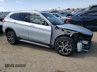2018 BMW X1 sDrive28i with VIN WBXHU7C38J3H42948, listed as a Copart auction lot 52061793 with 26,991 mi miles. Bid and sale history available at carsss.com. Image 4.