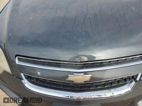 2013 Chevrolet Captiva Sport LTZ with VIN 3GNAL4EK1DS563058, listed as a Copart auction lot 83663354 with 110,108 mi miles and Salvage Title. Bid and sale history available at DreamBid. Image 12.