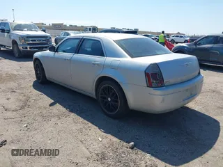 2007 Chrysler 300 with VIN 2C3KA43R67H664434, listed as a IAAI auction lot 41884172 with 238,451 mi miles. Bid and sale history available at carsss.com. Image 3.