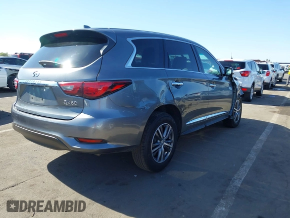 2018 Infiniti QX60 with VIN 5N1DL0MM0JC506333, listed as a IAAI auction lot 42135295 with 87,925 mi miles and . Bid and sale history available at DreamBid. Image 4.