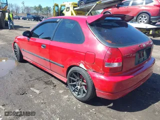 1997 Honda Civic DX with VIN 2HGEJ6449VH104445, listed as a IAAI auction lot 41886646 with 216,780 mi miles. Bid and sale history available at carsss.com. Image 3.