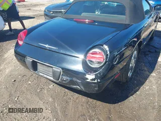 2002 Ford Thunderbird w/Hardtop Premium with VIN 1FAHP60AX2Y116200, listed as a IAAI auction lot 40129557 with 88,991 mi miles. Bid and sale history available at carsss.com. Image 17.