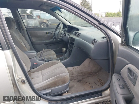 2000 Toyota Camry CE z VIN 4T1BG22KXYU690984, wystawiony jako IAAI lot #42222118 z przebiegiem 292 017 mil mil oraz . Historia ofert i sprzedaży dostępna na DreamBid. Obrazek 5.