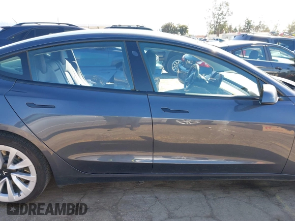 2022 Tesla Model 3 with VIN 5YJ3E1EA8NF241691, listed as a IAAI auction lot 41742584 with 70,375 mi miles and . Bid and sale history available at DreamBid. Image 13.
