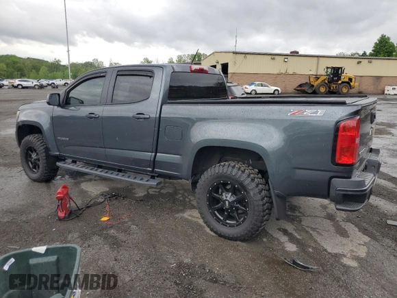 2015 Chevrolet Colorado 4WD Z71 with VIN 1GCGTCE35F1272962, listed as a Copart auction lot 55525325 with 129,701 mi miles and Salvage title. Bid and sale history available at DreamBid. Image 2.