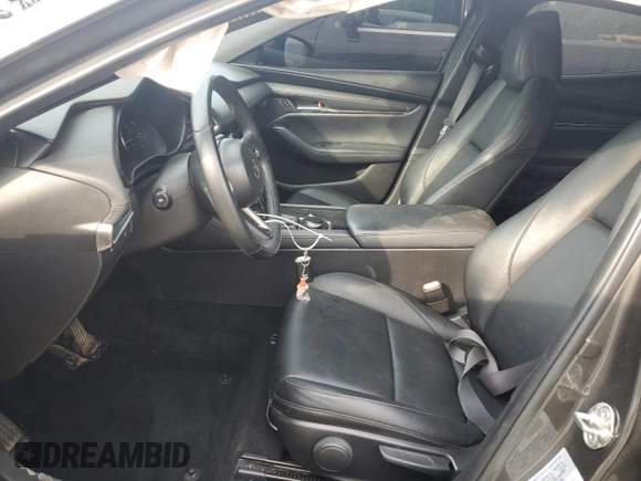 2019 Mazda 3 with VIN JM1BPAJMXK1119912, listed as a Copart auction lot 59708825 with 50,459 mi miles and Salvage title. Bid and sale history available at DreamBid. Image 7.