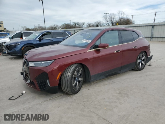 2023 BMW iX xDrive50 with VIN WB523CF01PCM76013, listed as a Copart auction lot 48326965 with 18,923 mi miles and Salvage Title. Bid and sale history available at carsss.com. Image 1.