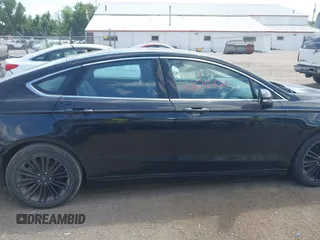 2016 Ford Fusion SE with VIN 3FA6P0HD8GR380945, listed as a IAAI auction lot 42626820 with 112,497 mi miles and . Bid and sale history available at DreamBid. Image 13.