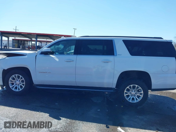 2019 GMC Yukon XL SLT with VIN 1GKS1GKC0KR330715, listed as a IAAI auction lot 41758626 with 134,641 mi miles. Bid and sale history available at carsss.com. Image 14.