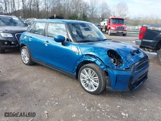 2024 MINI Hardtop 4 Door Cooper S with VIN WMW53DK02R2V73479, listed as a IAAI auction lot 41520180 with 6,104 mi miles. Bid and sale history available at carsss.com. Image 1.