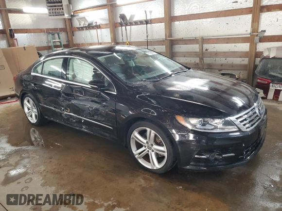 2014 Volkswagen CC R-Line with VIN WVWBN7AN3EE503237, listed as a Copart auction lot 77128394 with 84,995 mi miles and Salvage Title. Bid and sale history available at carsss.com. Image 4.