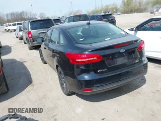 2016 Ford Focus SE with VIN 1FADP3FE6GL335943, listed as a IAAI auction lot 42060995 with 115,701 mi miles. Bid and sale history available at carsss.com. Image 3.