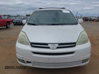 2004 Toyota Sienna XLE with VIN 5TDZA22CX4S141877, listed as a IAAI auction lot 42135971 with 219,688 mi miles. Bid and sale history available at carsss.com. Image 6.
