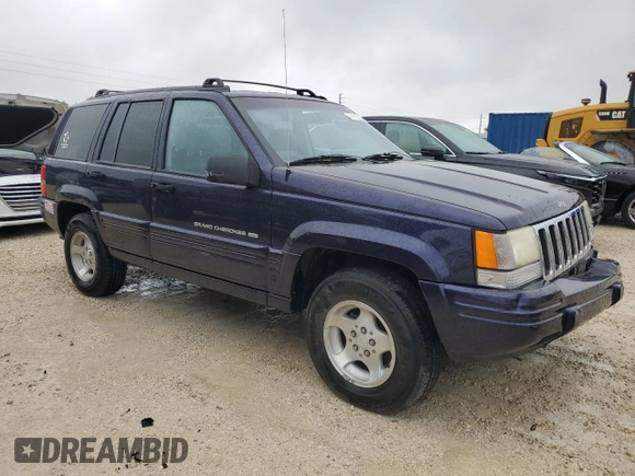 1998 Jeep Grand Cherokee with VIN 1J4FX48S1WC244308, listed as a Copart auction lot 74384714 with Not provided miles and Non repairable. Bid and sale history available at DreamBid. Image 4.