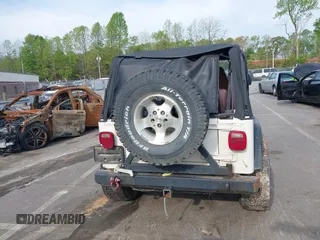 1998 Jeep Wrangler Sport with VIN 1J4FY19S5WP788331, listed as a IAAI auction lot 42027717 with 201,119 mi miles and . Bid and sale history available at DreamBid. Image 16.