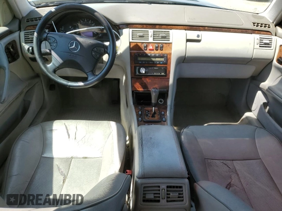 2000 Mercedes-Benz E-Class with VIN WDBJF65J1YB151080, listed as a Copart auction lot 54421955 with 392,612 mi miles and Salvage Title. Bid and sale history available at carsss.com. Image 8.