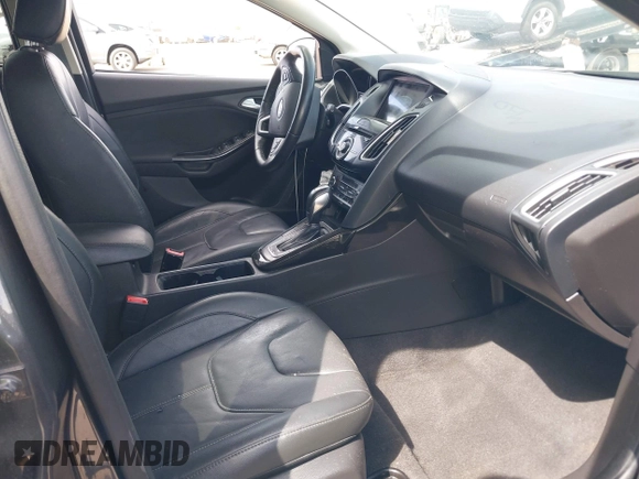 2018 Ford Focus Titanium with VIN 1FADP3N23JL241453, listed as a IAAI auction lot 42025190 with 90,174 mi miles and . Bid and sale history available at DreamBid. Image 5.