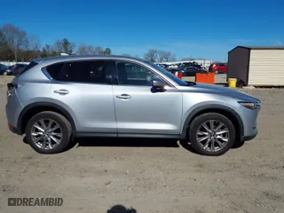 2020 Mazda CX-5 Grand Touring with VIN JM3KFADM7L0731479, listed as a IAAI auction lot 41697226 with 90,517 mi miles. Bid and sale history available at carsss.com. Image 14.