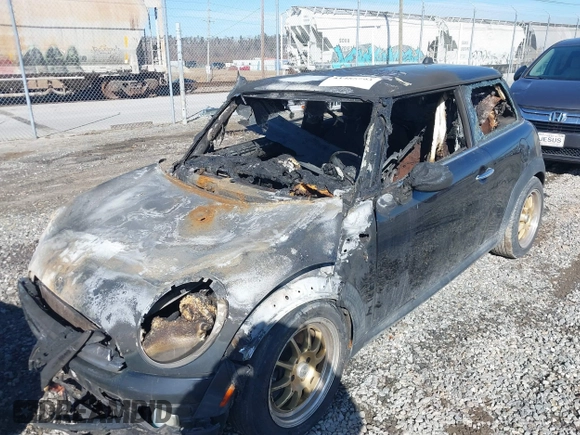 2008 MINI Hardtop with VIN WMWMF33508TU64051, listed as a IAAI auction lot 41485793 with Not Provided miles and . Bid and sale history available at DreamBid. Image 2.