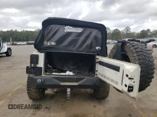 2007 Jeep Wrangler Unlimited X with VIN 1J4GA39147L207549, listed as a Copart auction lot 47291165 with 141,325 mi miles and Salvage title. Bid and sale history available at DreamBid. Image 6.