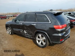 2016 Jeep Grand Cherokee Overland with VIN 1C4RJFCG8GC402339, listed as a Copart auction lot 47553385 with 121,486 mi miles and Salvage title. Bid and sale history available at DreamBid. Image 2.