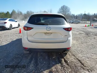 2018 Mazda CX-5 Grand Touring with VIN JM3KFADM0J0377026, listed as a IAAI auction lot 41649686 with 100,901 mi miles and . Bid and sale history available at DreamBid. Image 16.