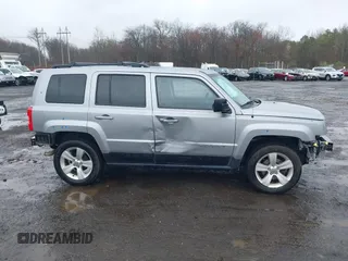 2015 Jeep Patriot High Altitude with VIN 1C4NJRFB2FD292056, listed as a IAAI auction lot 42016017 with 80,462 mi miles and . Bid and sale history available at carsss.com. Image 14.