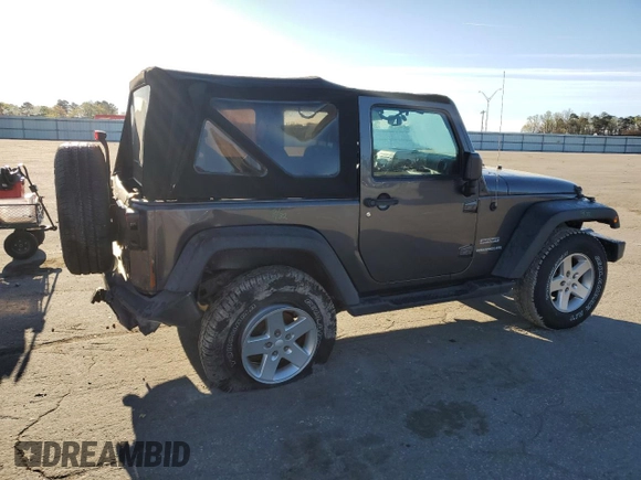 2016 Jeep Wrangler Willys Wheeler with VIN 1C4AJWAG5GL266235, listed as a Copart auction lot 50237195 with 60,830 mi miles and Salvage title. Bid and sale history available at DreamBid. Image 3.