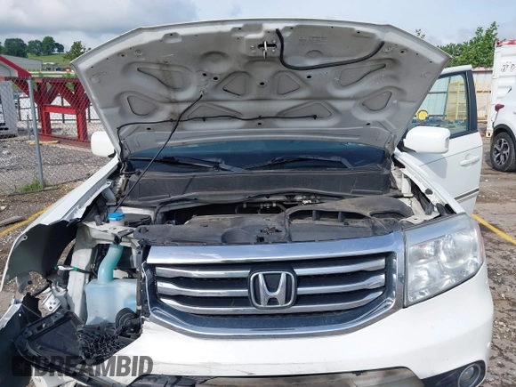 2013 Honda Pilot Touring z VIN 5FNYF4H99DB017351, wystawiony jako IAAI lot #42355167 z przebiegiem 122 191 mil mil oraz . Historia ofert i sprzedaży dostępna na DreamBid. Obrazek 10.
