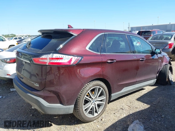 2019 Ford Edge Titanium z VIN 2FMPK3K94KBB41673, wystawiony jako IAAI lot #41762692 z przebiegiem 82 812 mil mil oraz . Historia ofert i sprzedaży dostępna na DreamBid. Obrazek 4.